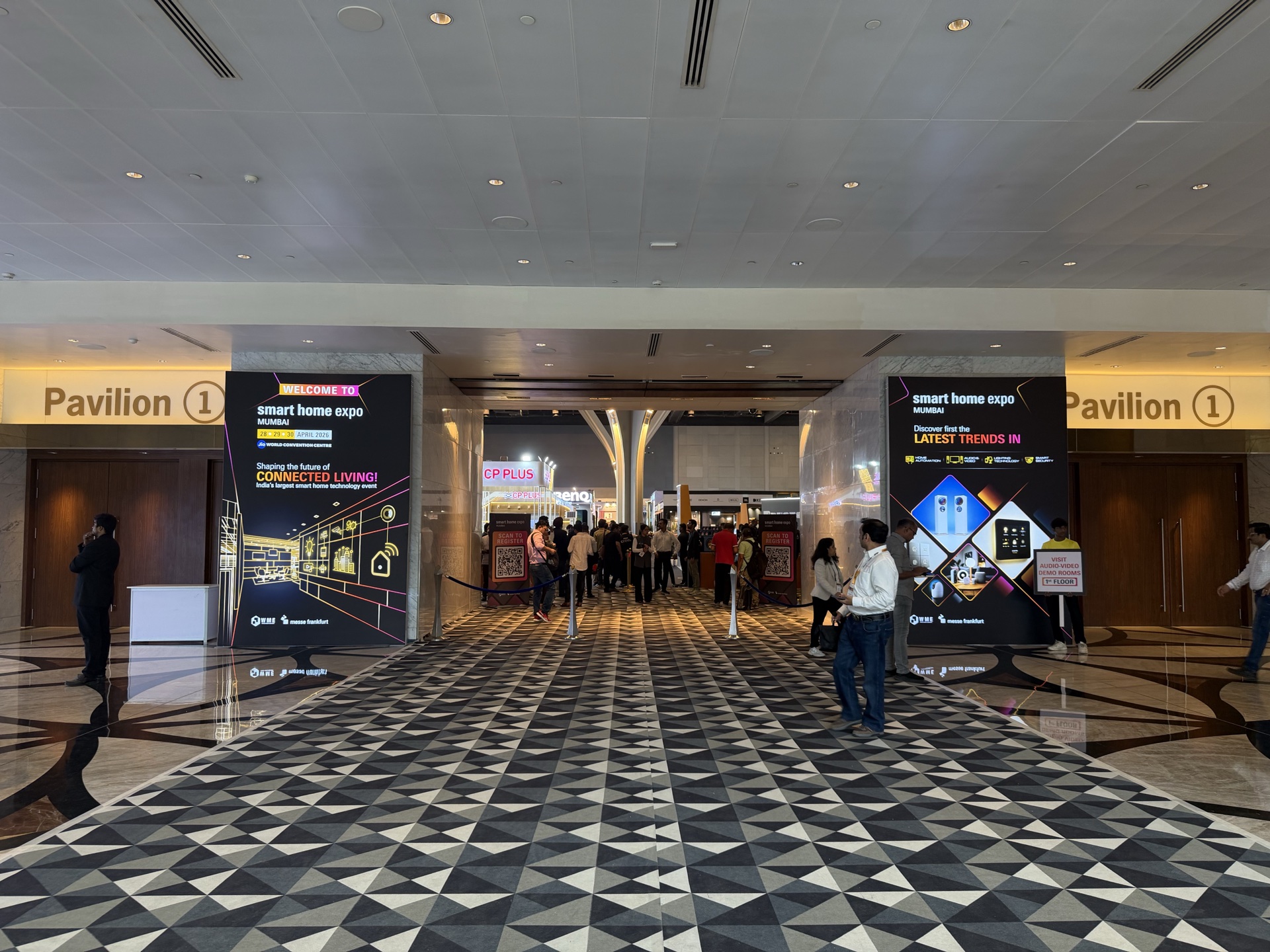 Grand convention centre foyer with bold black and white diamond-grid printed carpet at Smart Home Expo Mumbai